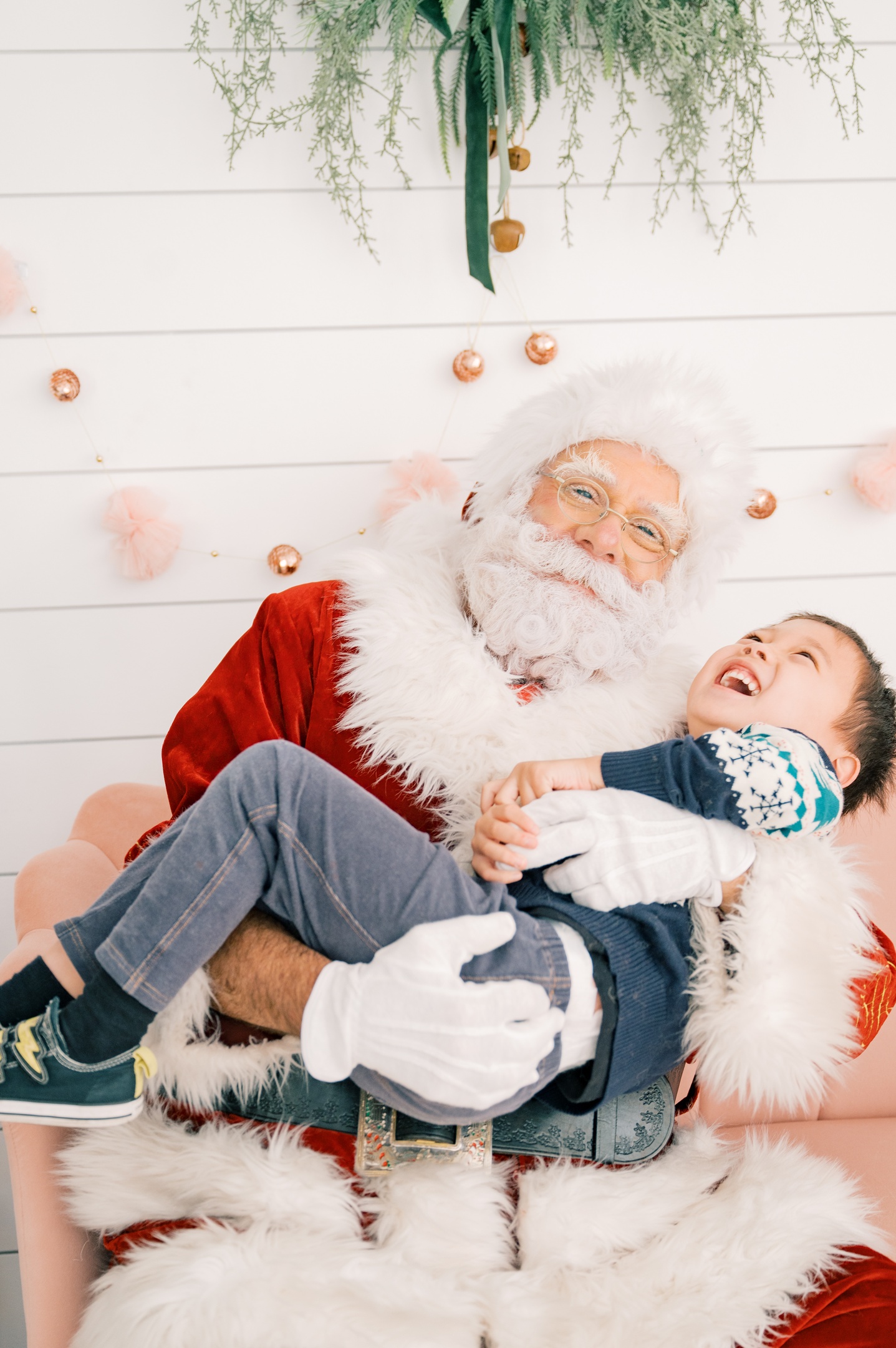 Santa Albert Sharing a Joyful Moment During a Family Home Visit